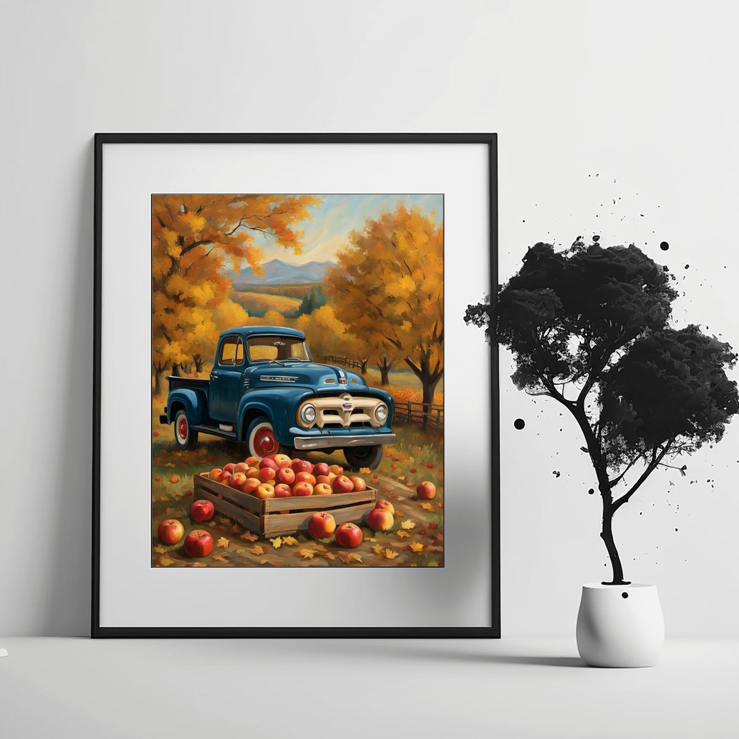 Framed autumn orchard harvest painting featuring a vintage blue truck and a crate of red apples