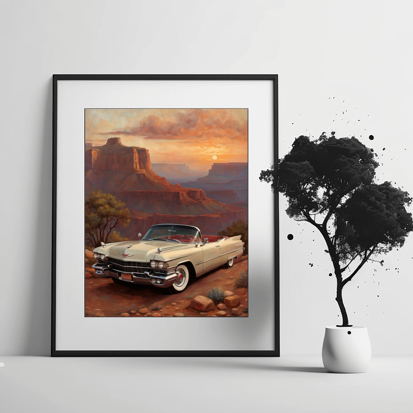 Framed Grand Canyon sunset artwork featuring a classic car with mountains and sunset sky
