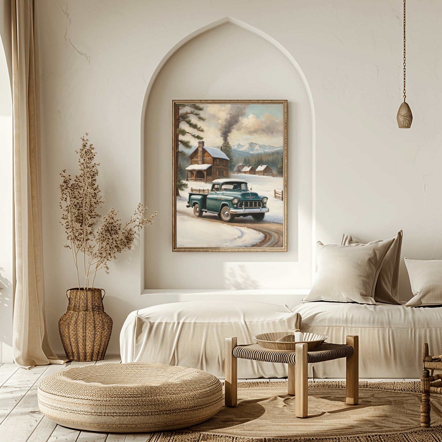 Framed snowy countryside art print with vintage truck and cabin in neutral modern living room