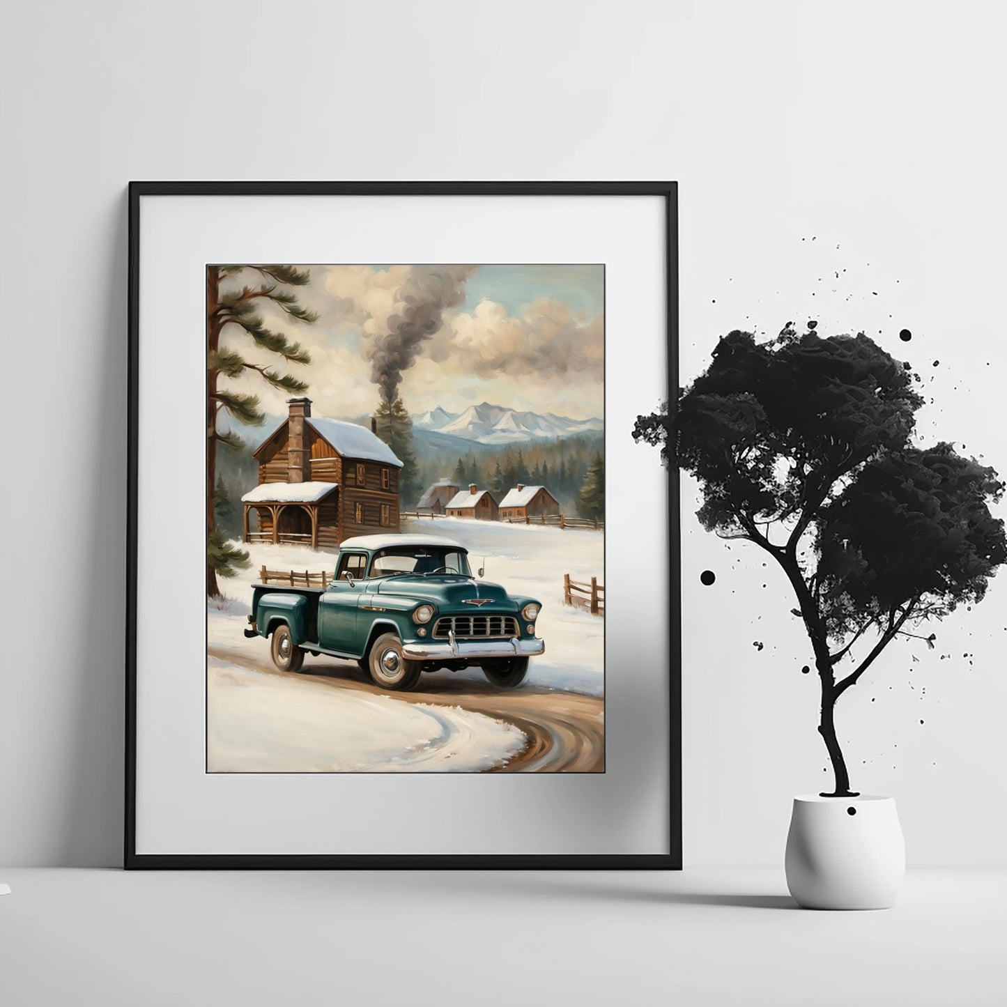 Framed snowy countryside art print featuring a vintage green truck and rustic cabin with smoke in the background
