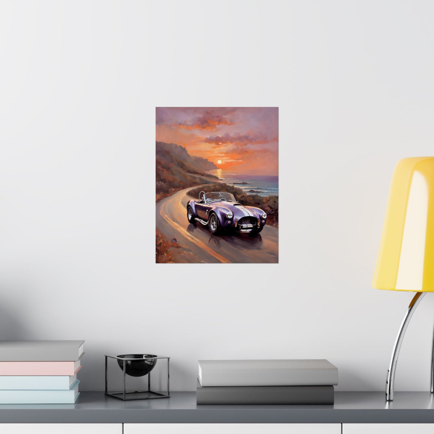 Vintage American Car Art featuring a classic car driving along a scenic coastal road at sunset