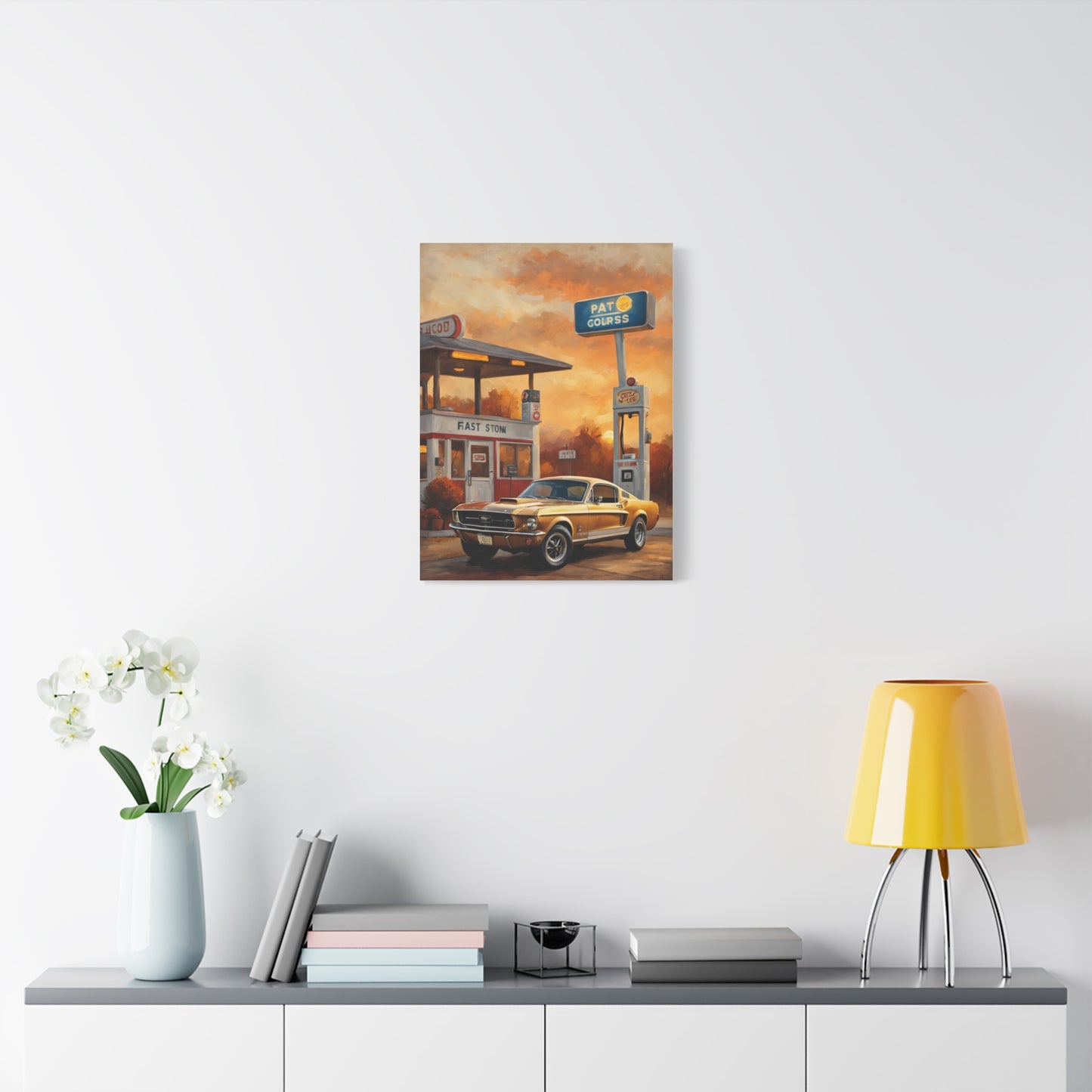 Vintage Car Art Print featuring a classic car near a retro gas station with a colorful sunset backdrop
