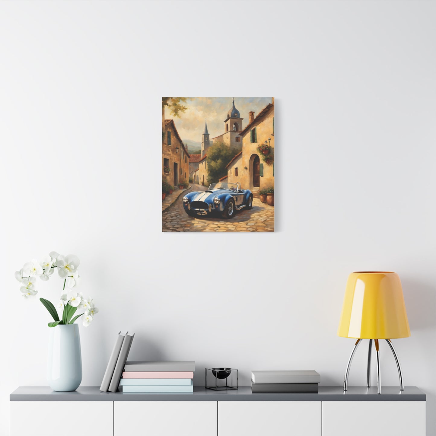 Vintage Car Canvas Art Print featuring a classic blue car on a cobblestone street with buildings