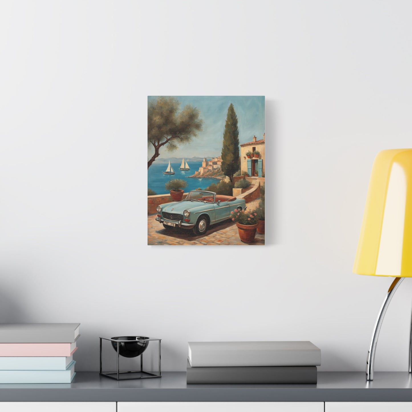Vintage Car Canvas Print showing a classic car near a seaside villa with boats in the background