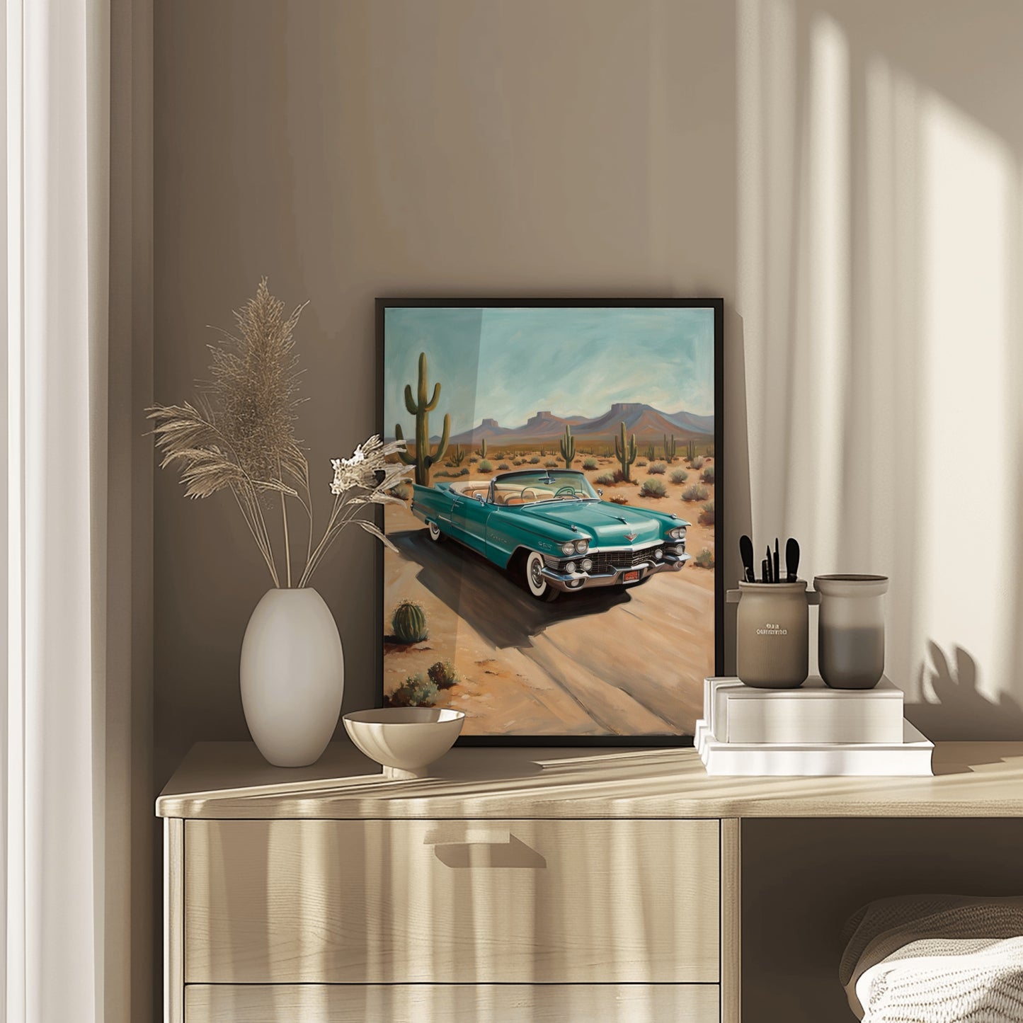 Desert highway wall art featuring a vintage turquoise car driving through a cactus-filled desert landscape