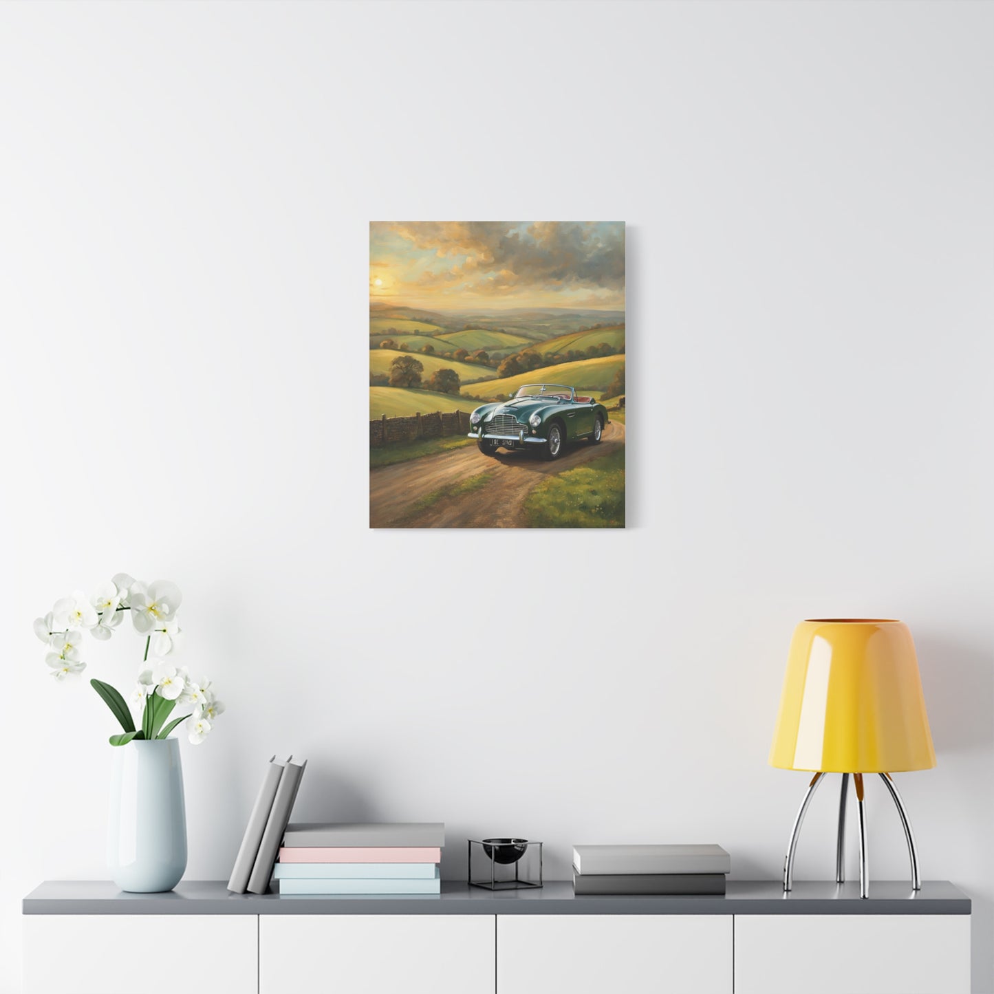 Vintage Car Landscape Canvas featuring a classic car on a scenic road with rolling hills