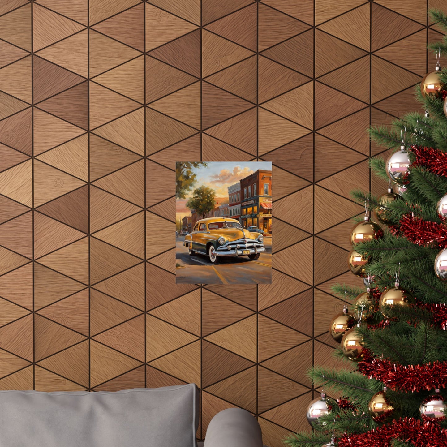 Vintage car wall art print displayed on a geometric patterned wall near a Christmas tree