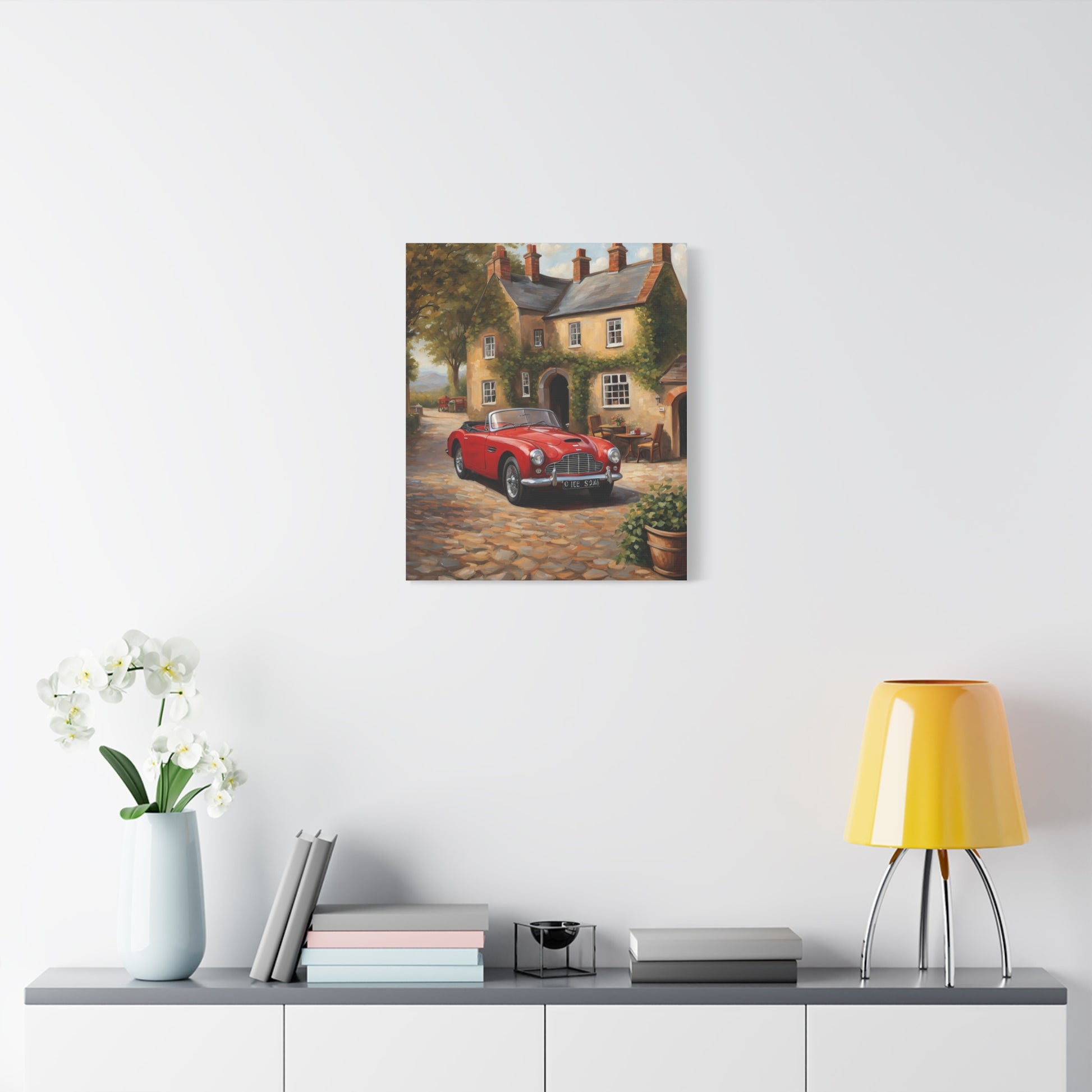 Charming Car Canvas featuring a red vintage car near a picturesque cottage and garden
