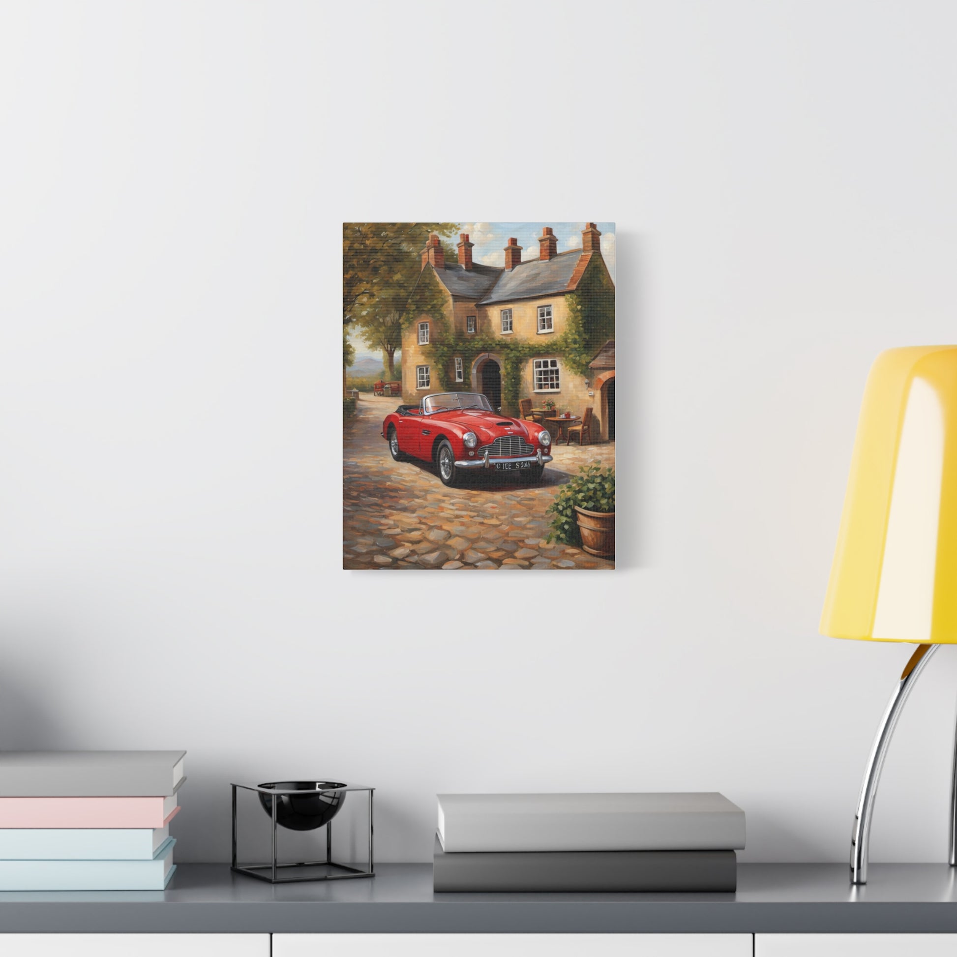 Charming Car Canvas featuring a red vintage car outside a quaint cottage on a cobblestone street