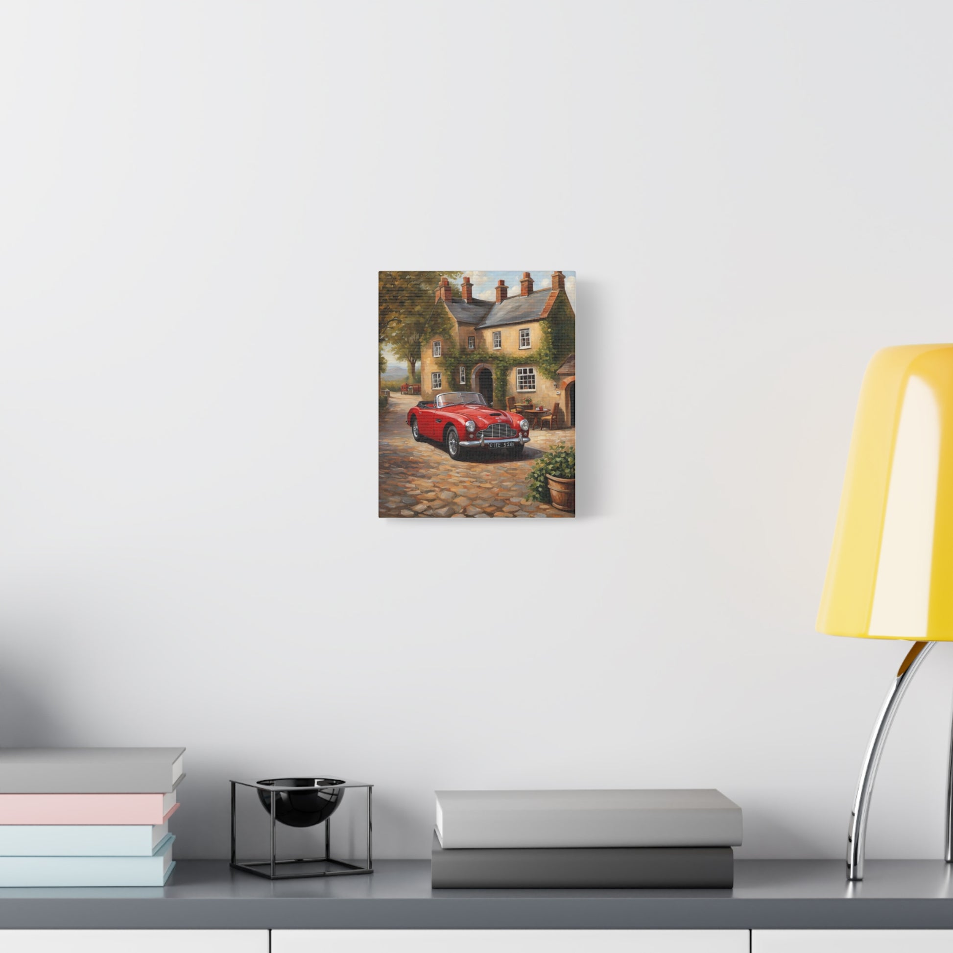 Charming Car Canvas featuring a red vintage car parked by a cottage on a cobblestone path