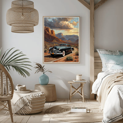 Classic car art print for home featuring a vintage black car on a desert road with mountains and dramatic sky