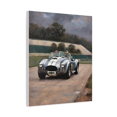 Classic Car Canvas Print featuring a retro silver sports car on a scenic racetrack