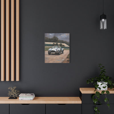 Classic Car Canvas Print featuring a vintage racing car on a scenic road, perfect for home decor
