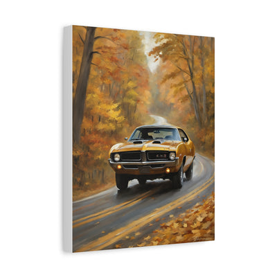 Classic Car Canvas Print featuring a vintage yellow muscle car driving on a scenic autumn road