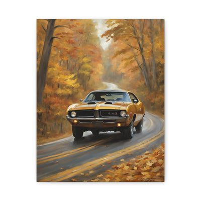 Classic Car Canvas Print featuring a vintage car driving down a scenic fall road with colorful leaves