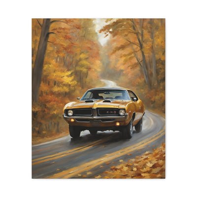 Classic Car Canvas Print featuring an orange vintage muscle car driving on a winding road through autumn trees