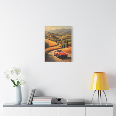 Vintage Classic Car Canvas Wall Art featuring a red car on a winding road in scenic hills