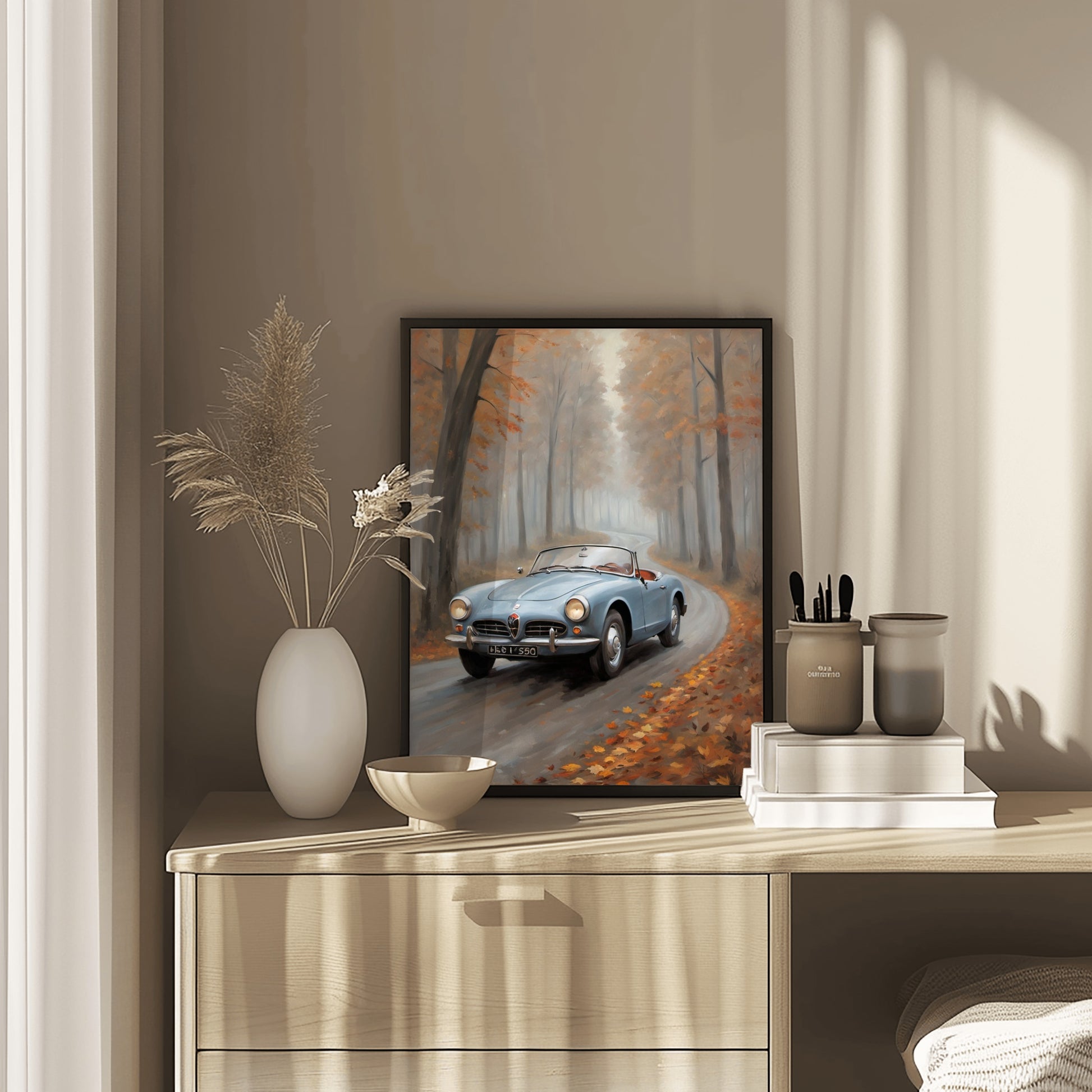moody forest oil painting print featuring a classic car driving on a winding autumn road