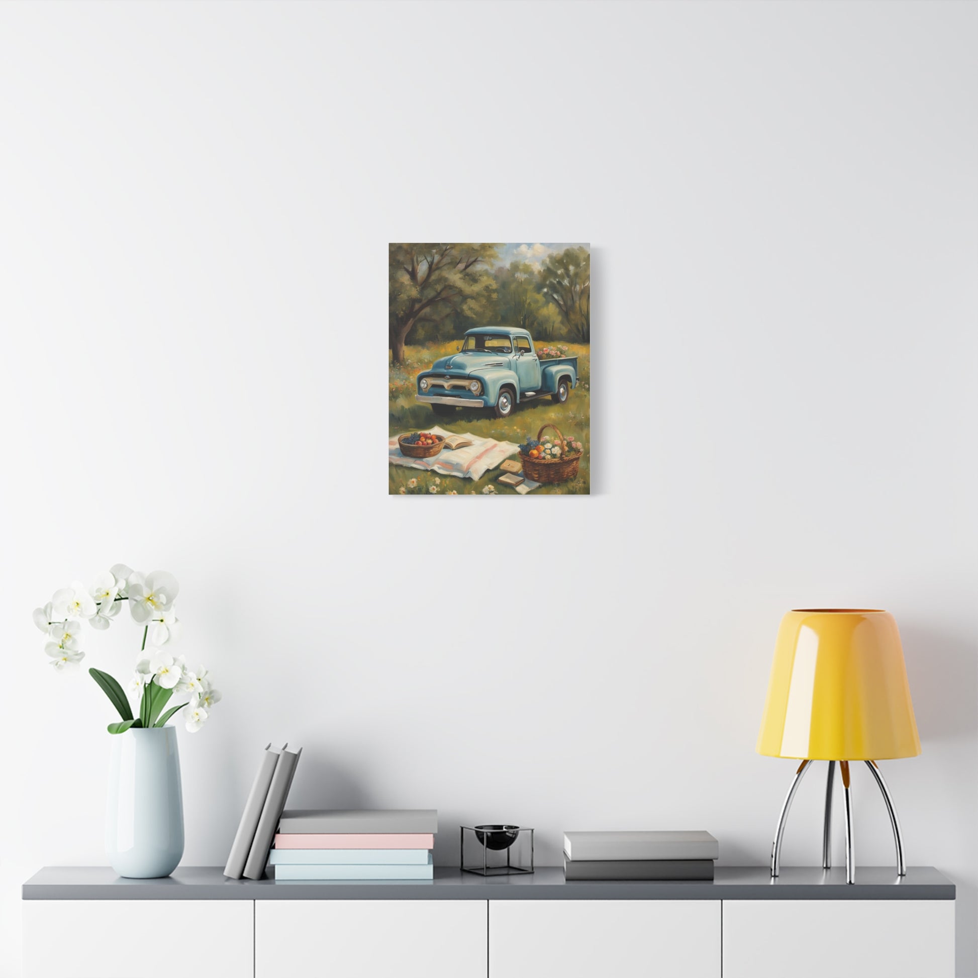 Old Truck Canvas Art Print featuring a vintage blue truck amidst a serene outdoor setting