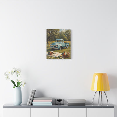 Old Truck Canvas Art Print featuring a vintage blue truck amidst a serene outdoor setting
