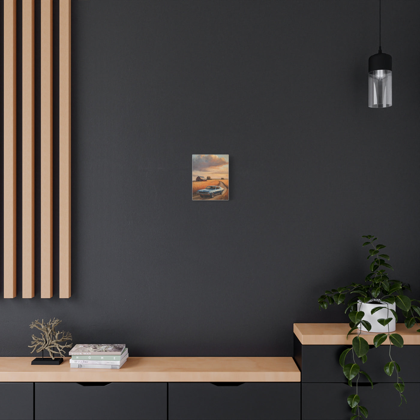 Retro Car Artwork displayed on a stylish black wall above a modern wooden console table