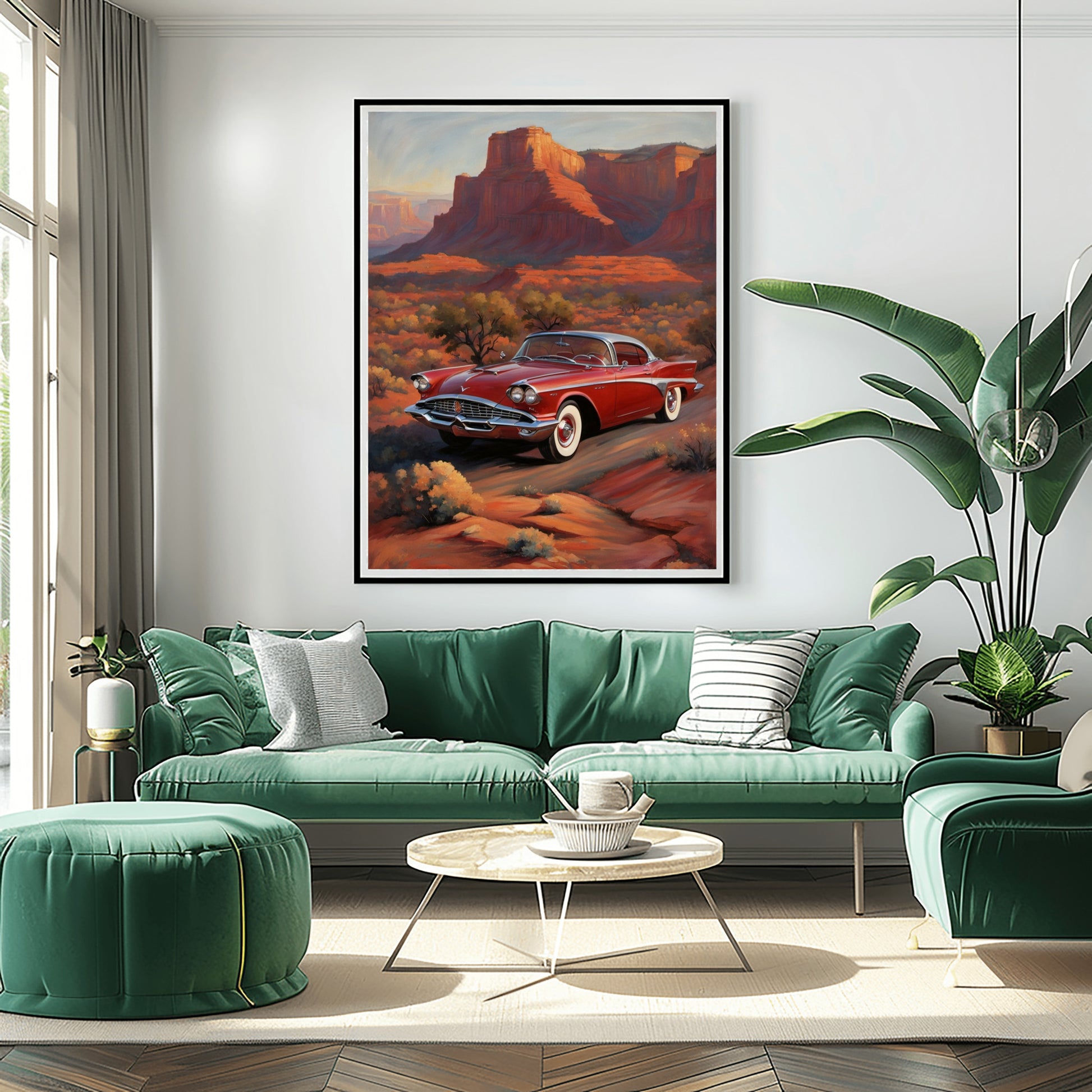 Framed digital artwork silhouette desert decor featuring a vintage red car in a canyon setting above green sectional sofa