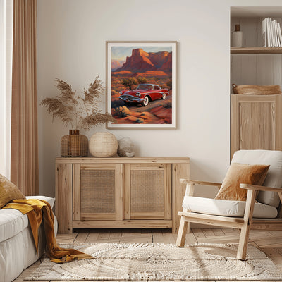 Living room with wooden cabinet, framed vintage car desert print, and silhouette desert decor accents