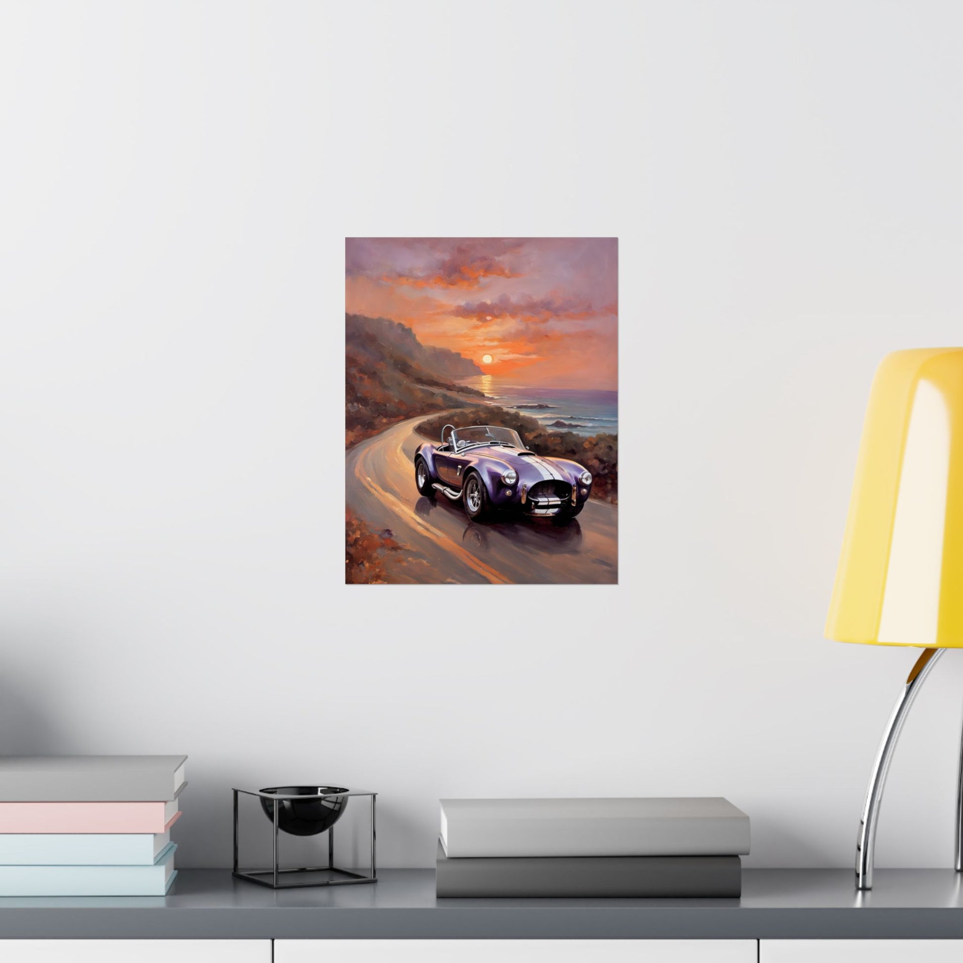Vintage American Car Art featuring a classic car driving along a scenic coastal road at sunset