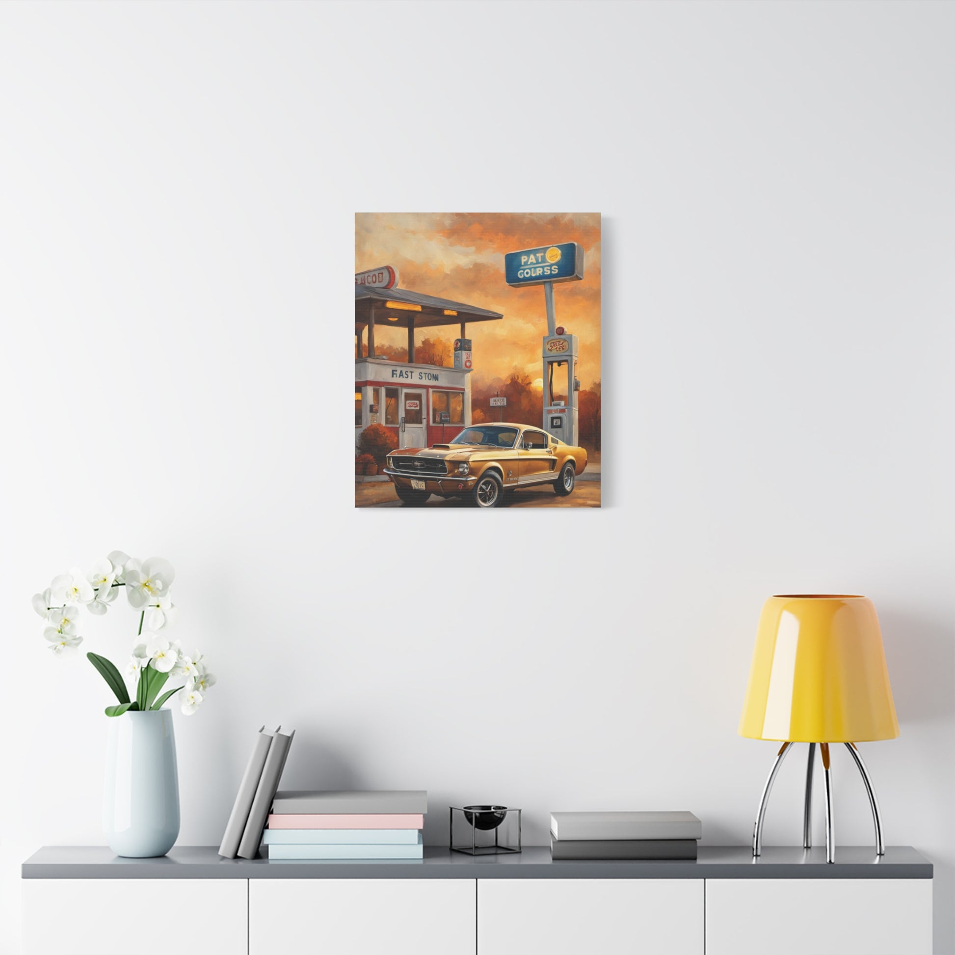 Vintage Car Art Print featuring a classic car at a retro gas station with an orange sunset background