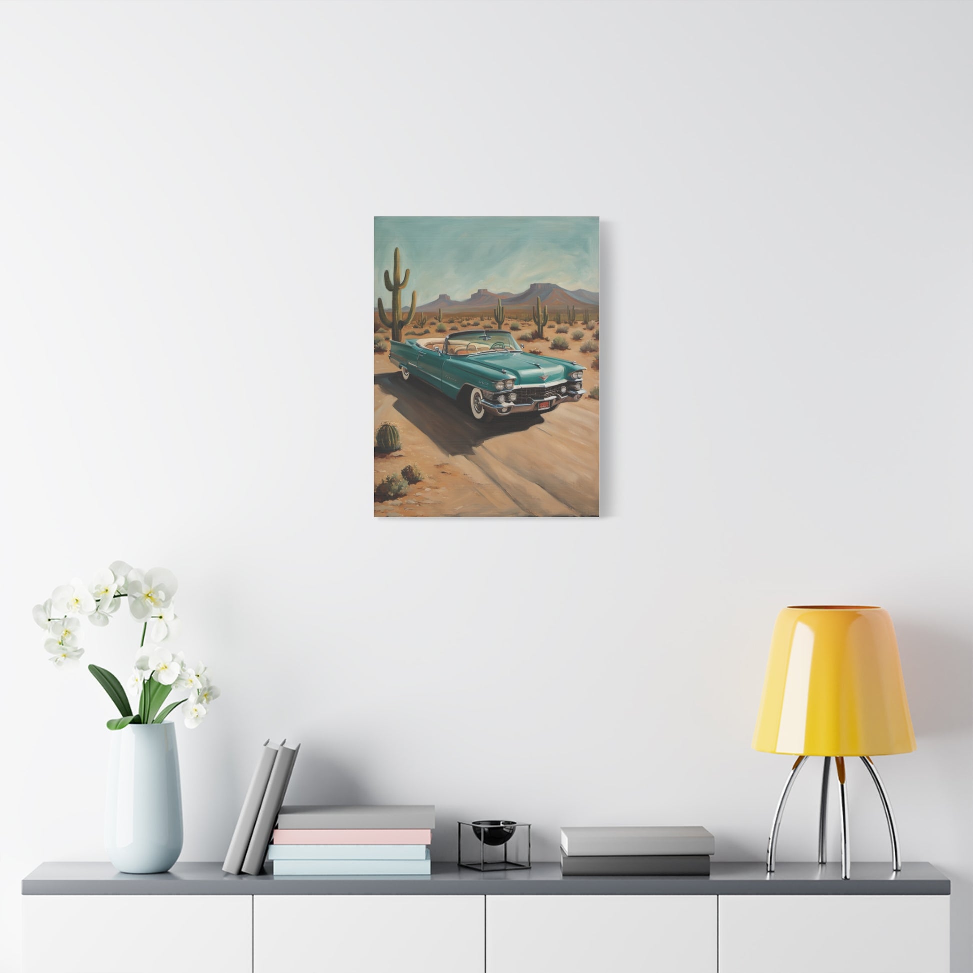 Vintage Car Canvas Art featuring a classic car in a desert landscape with cacti and mountains