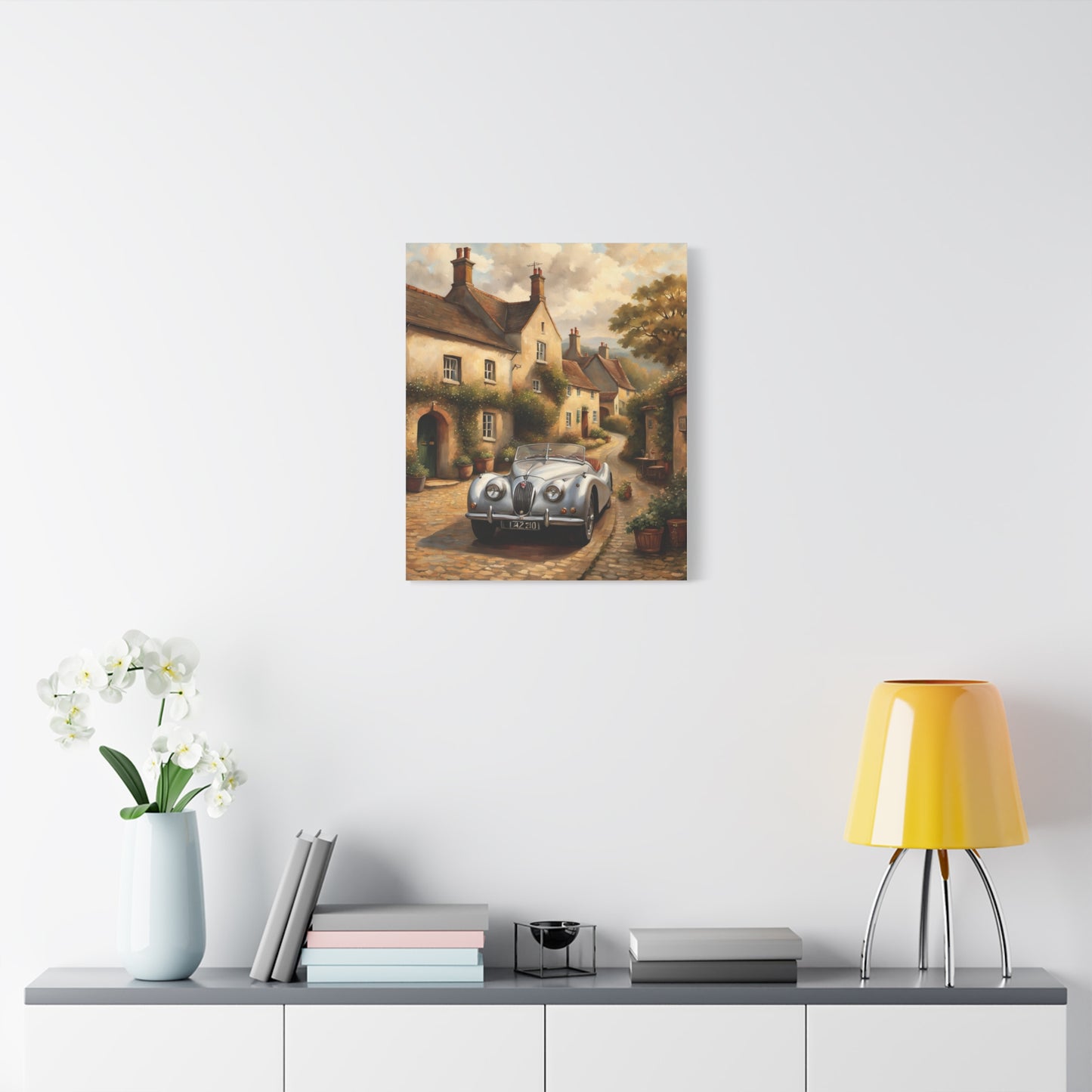 Vintage Car Canvas Art featuring a classic car in a scenic village setting