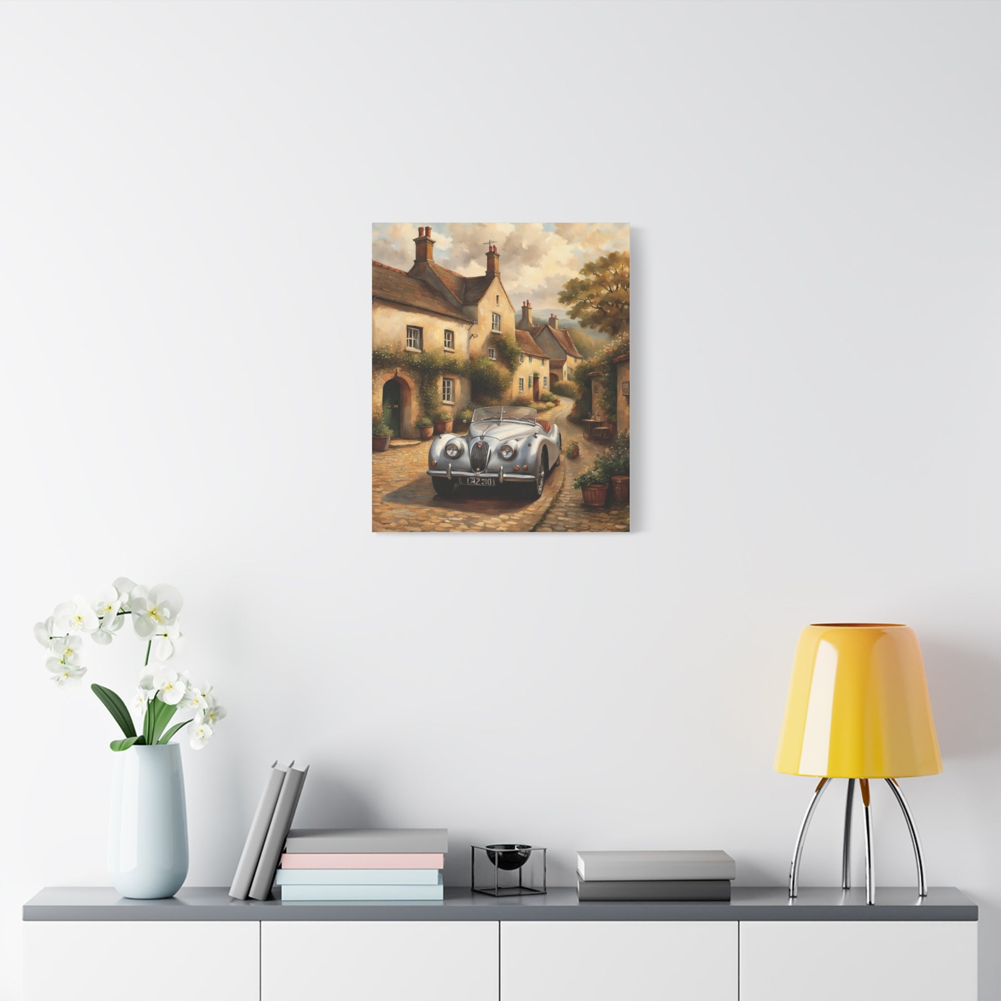 Vintage Car Canvas Art featuring a classic car in a scenic village setting