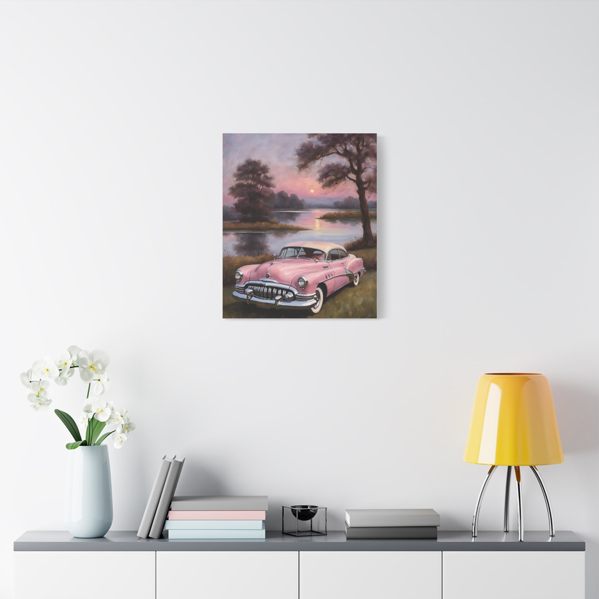 Vintage Car Canvas Art Prints featuring a classic pink car by a serene lake at sunset