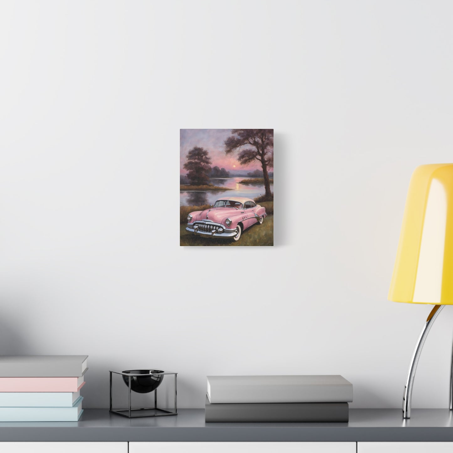 Vintage Car Canvas Art Prints featuring a classic pink car by a tranquil lake at sunset