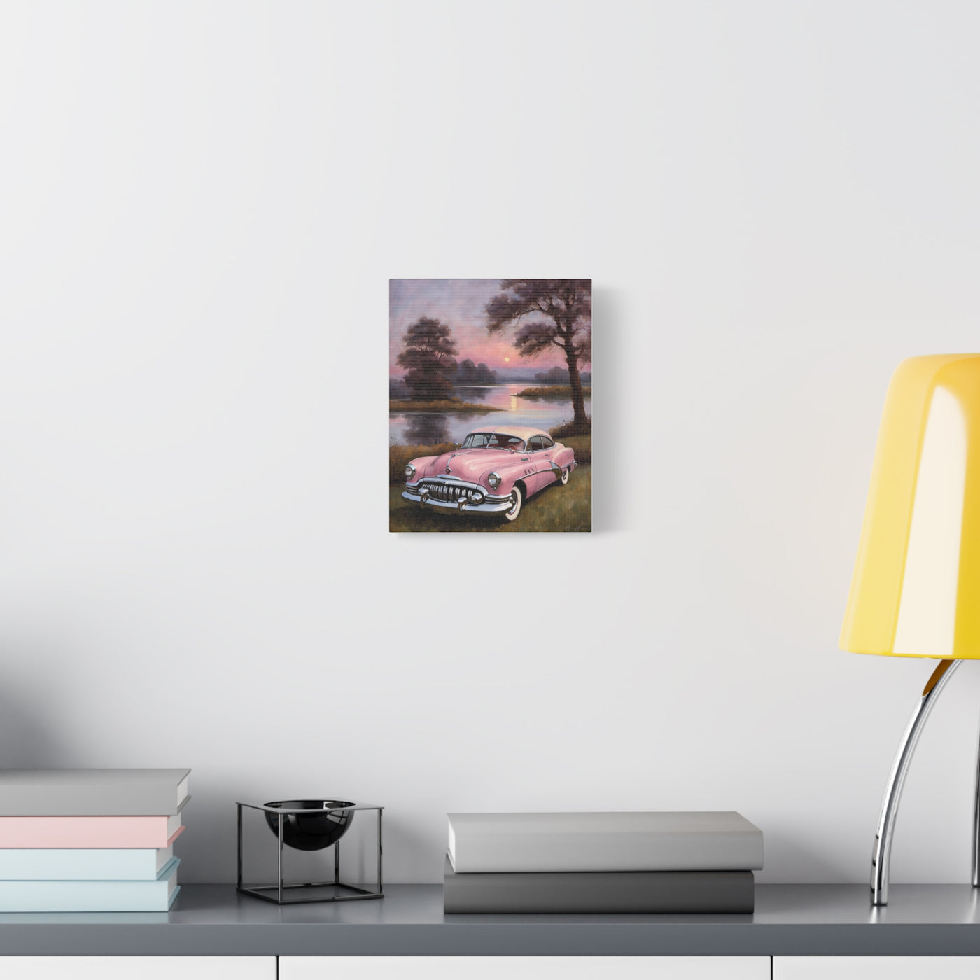 Vintage Car Canvas Art Prints featuring a classic pink car by a tranquil lake at sunset