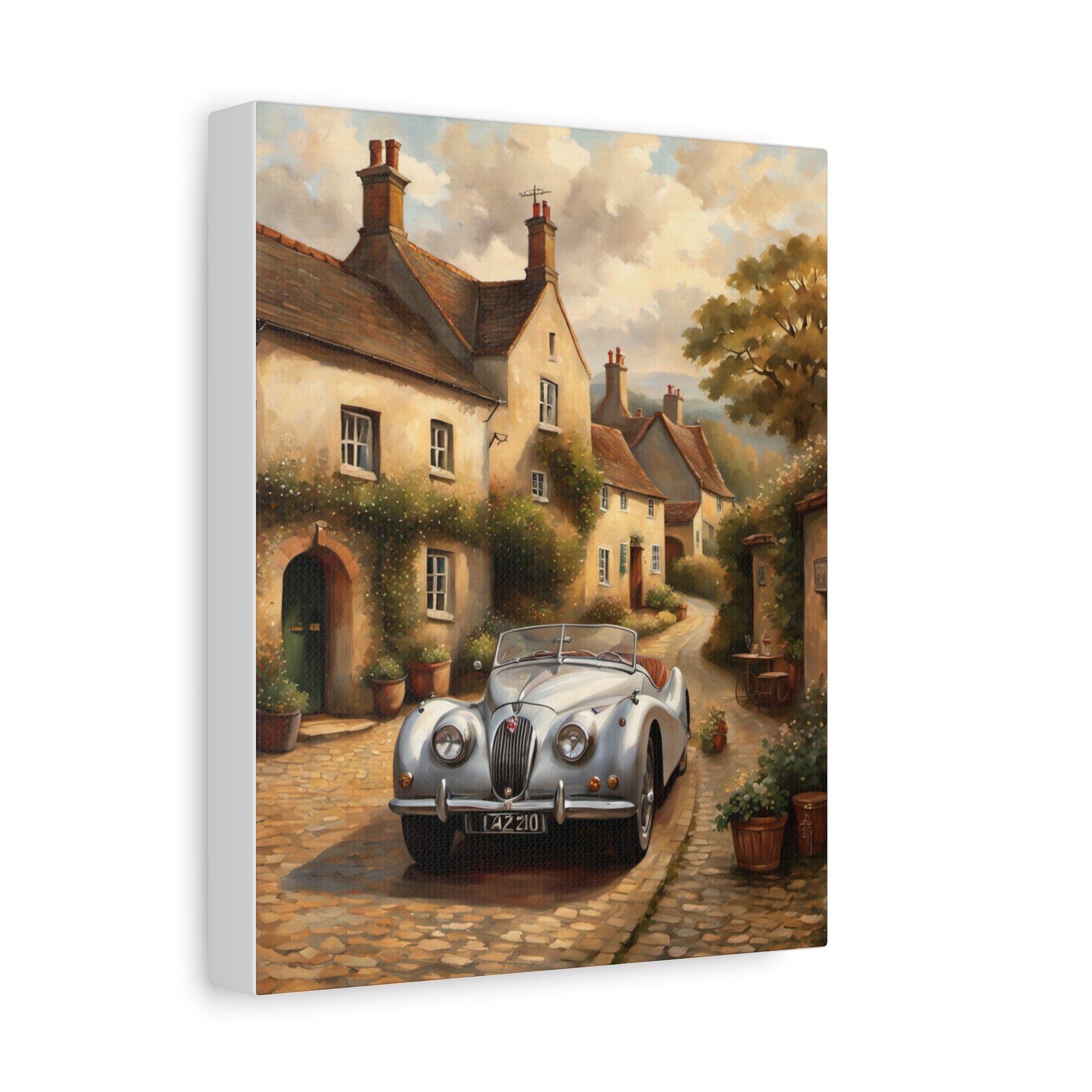 Vintage Car Canvas Art featuring a classic silver car parked in a charming village with cottages