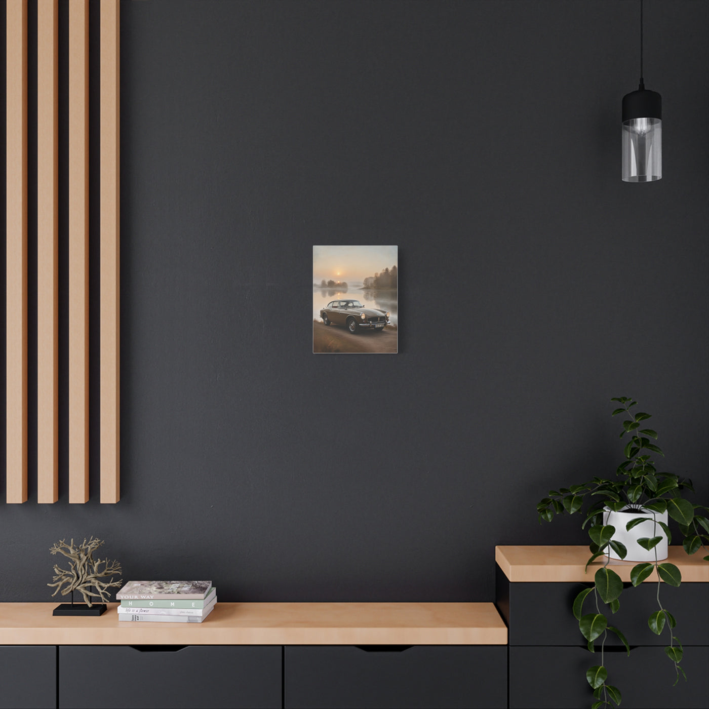 Vintage Car Canvas art displayed on a modern black wall above a wooden console table