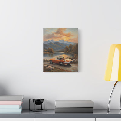 Vintage Car Canvas Print featuring a classic car by a scenic lakeside with mountains at sunset