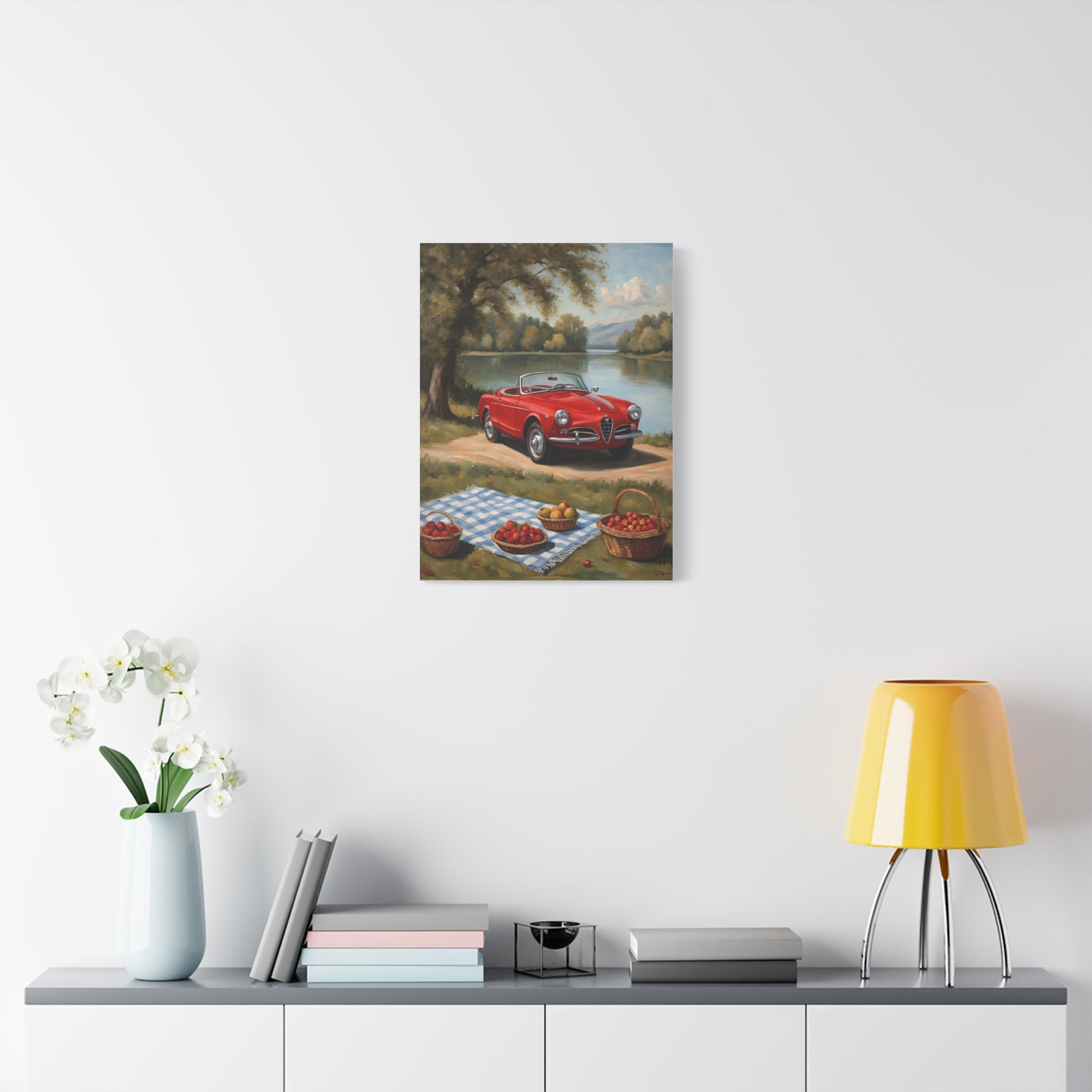 Vintage Car Canvas Wall Art featuring a red classic car parked near a lake with picnic setup