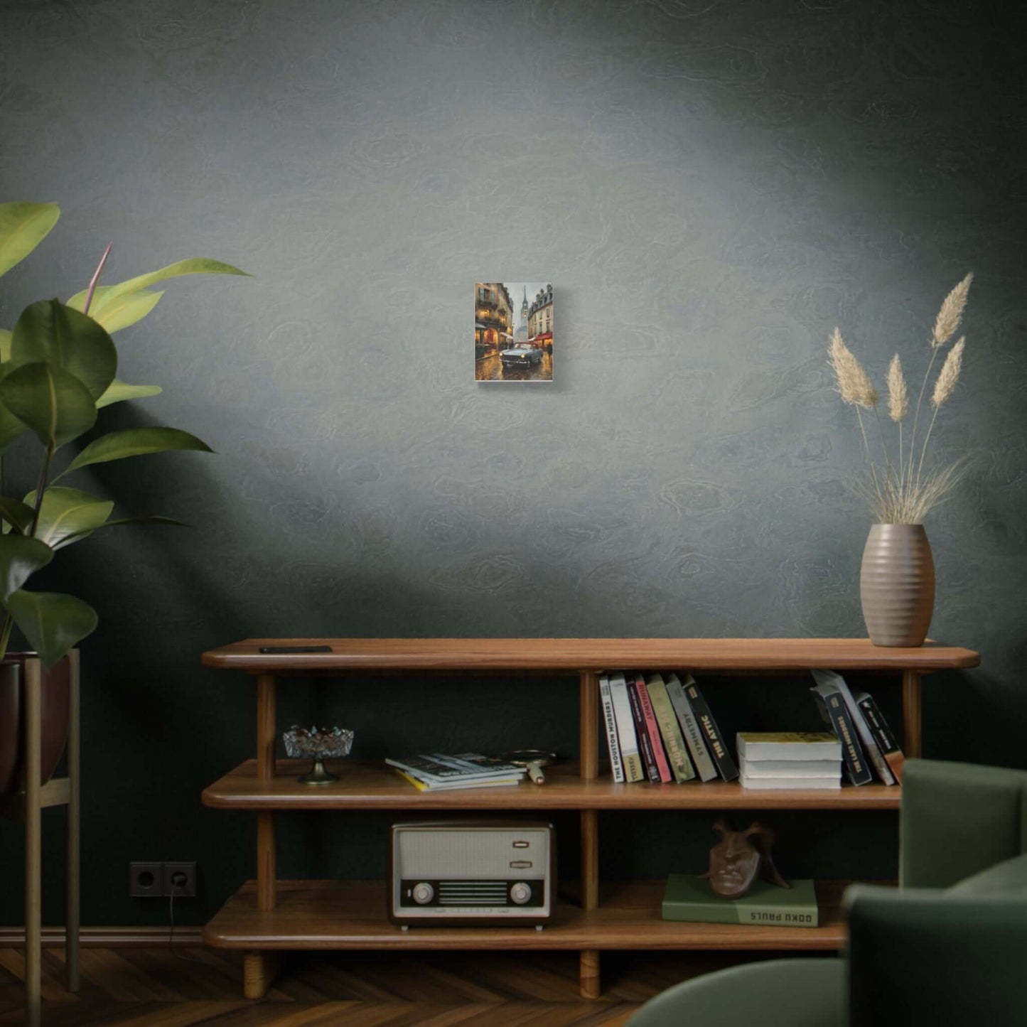Vintage car cityscape canvas art displayed on a wooden shelf with plants and books