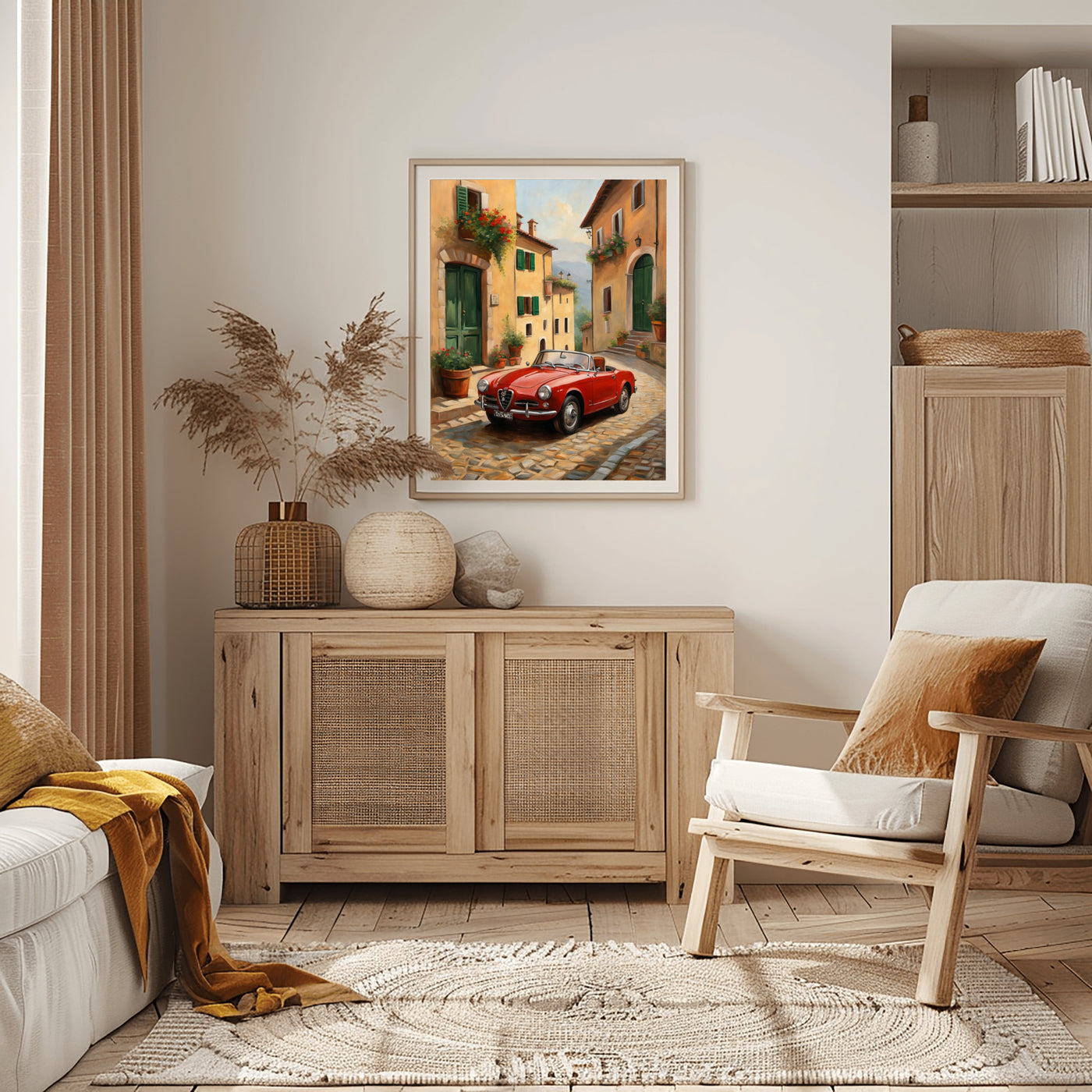 Vintage car home decor print featuring a red classic car on a cobblestone street in a framed wall art above wooden sideboard