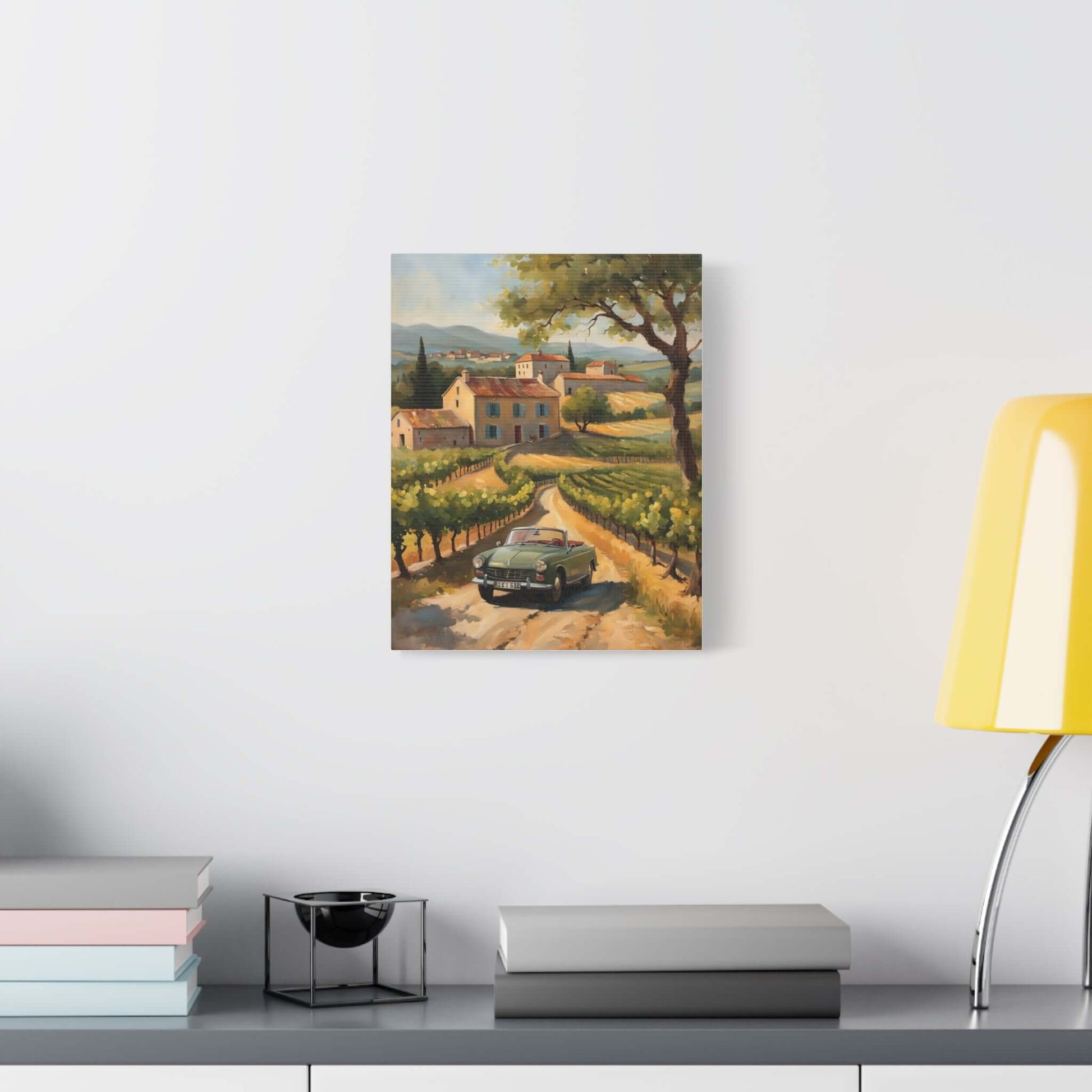 Vintage car landscape canvas art depicting a classic car on a scenic vineyard road