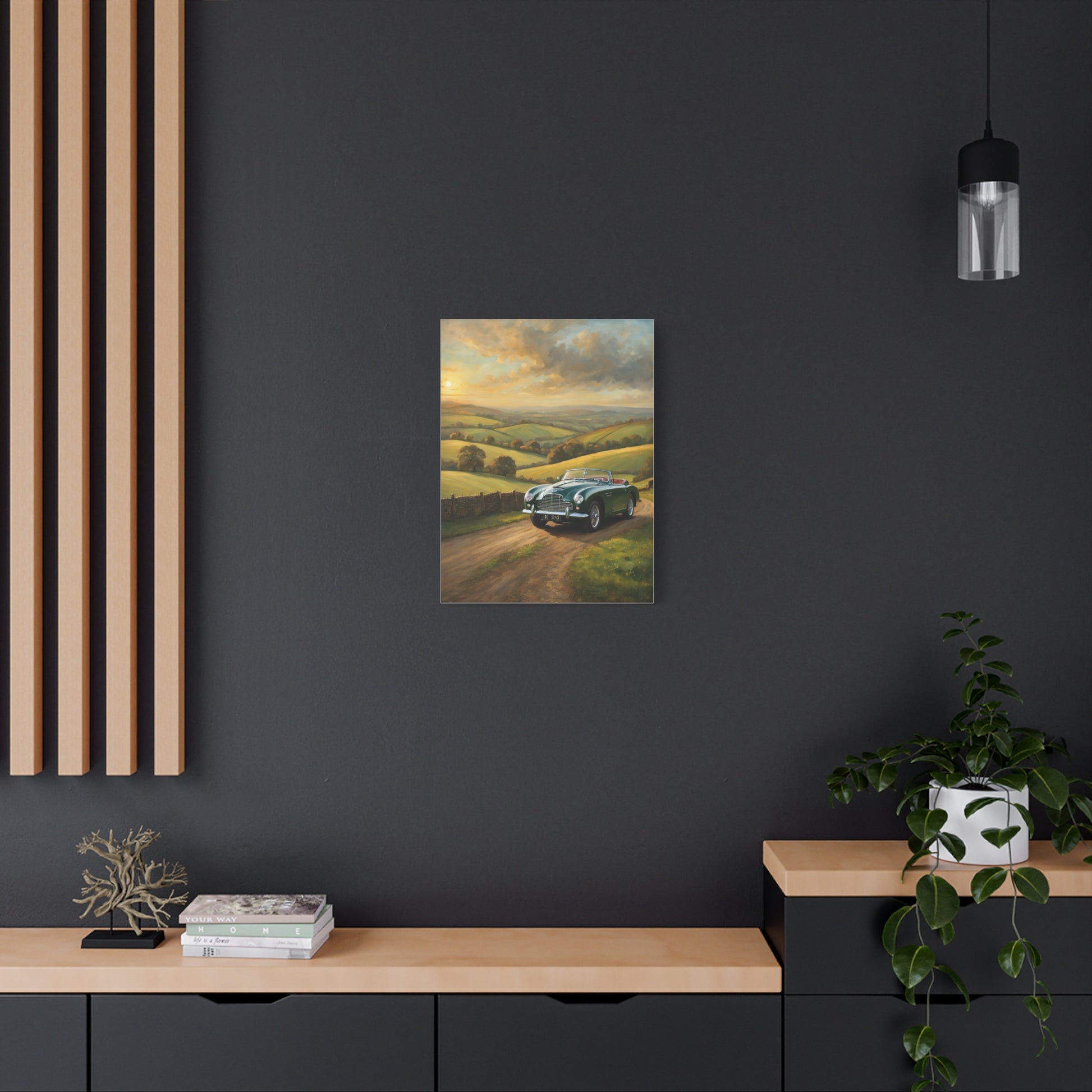 Vintage Car Landscape Canvas featuring a classic car on a scenic road amidst rolling hills