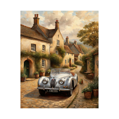 Vintage car poster wall art featuring a classic silver car in a quaint village setting