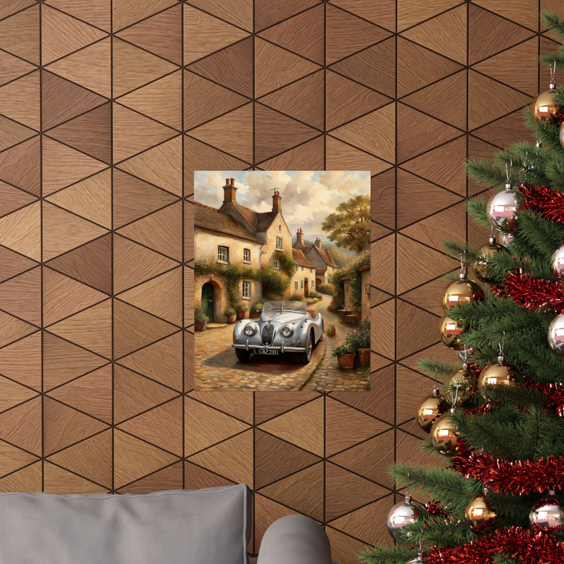 Vintage car poster wall art featuring a classic car in a picturesque village setting