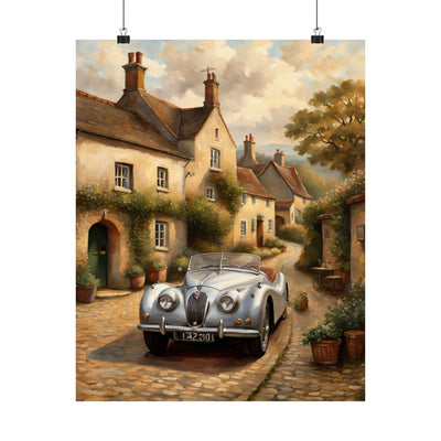 Vintage car poster wall art featuring a classic silver car on a charming village street