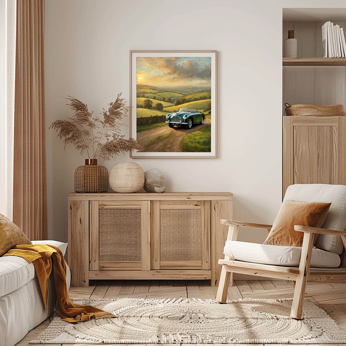 Vintage car sunset artwork framed on wall above wooden cabinet in cozy modern living room