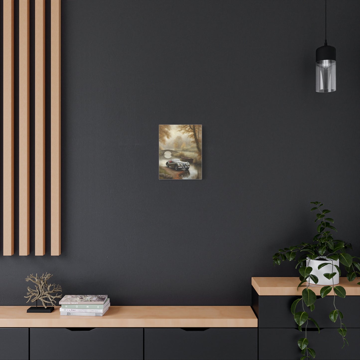 Vintage Car Wall Art displayed on a dark wall above a wooden side table with decor elements