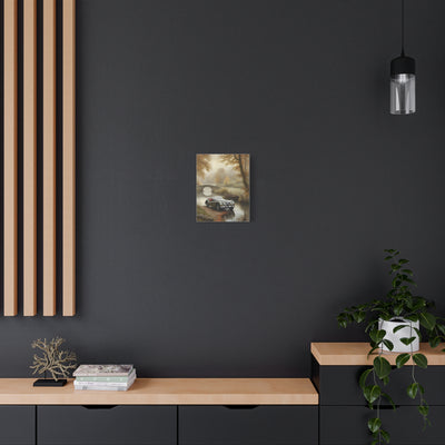 Vintage Car Wall Art displayed on a dark wall above a wooden side table with decor elements