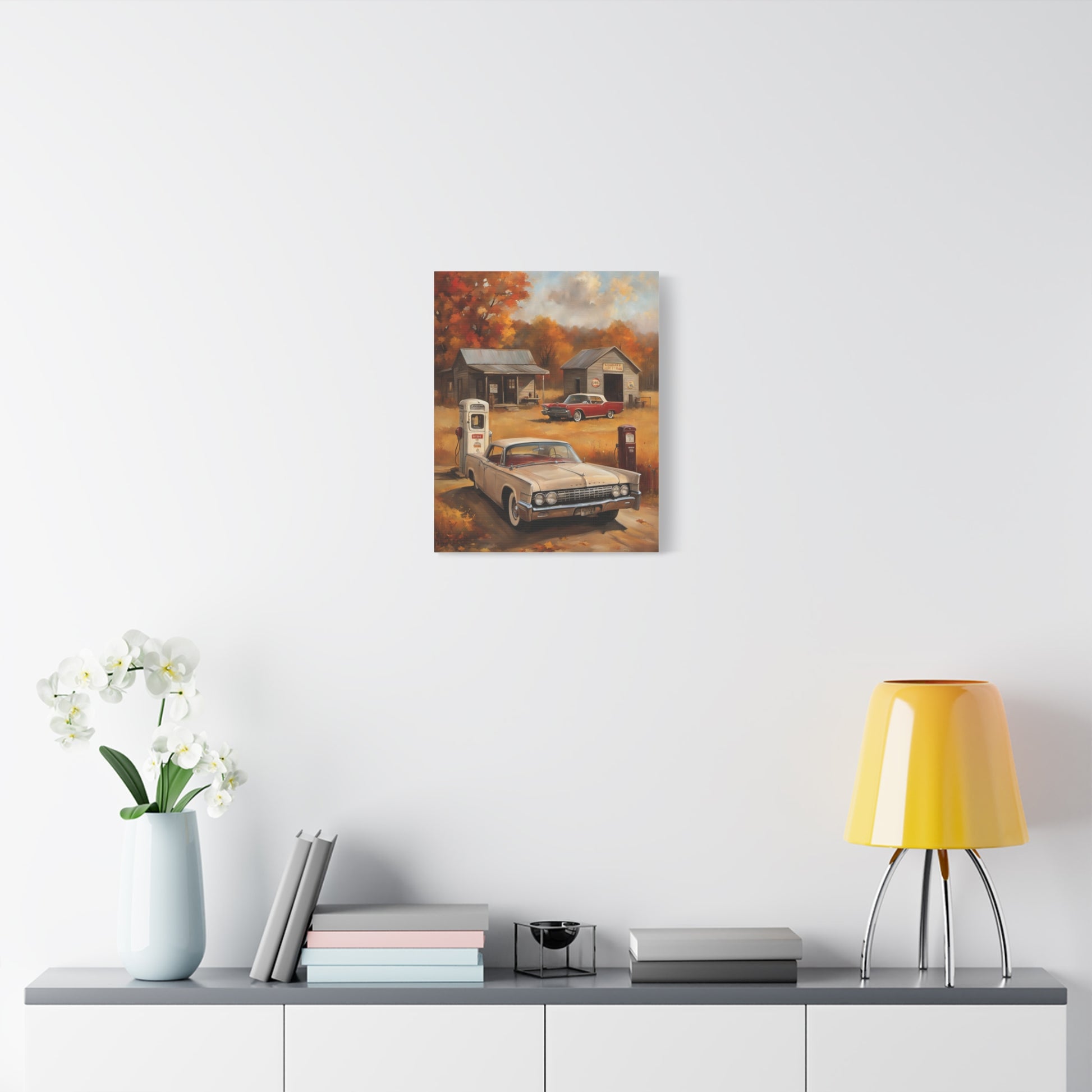 Vintage Gas Station Art Print featuring a classic car and autumn scenery on a wall display